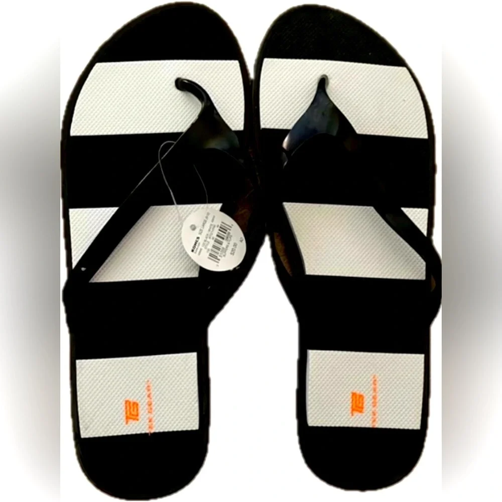 Tek Gear black and white flip flops. New with tag. Women’s size L (9-10)